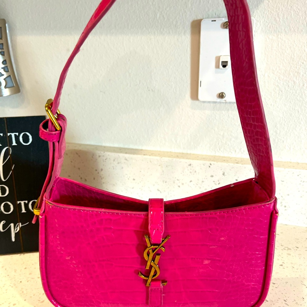 SAINT LAURENT
Smooth Calfskin 
Bubblegum color or pink 
Lightly used